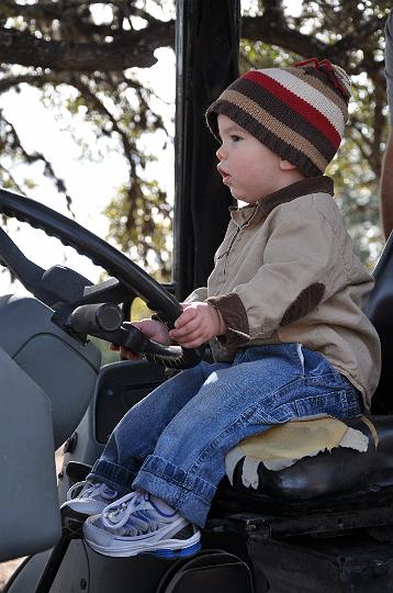 Jackson driving the tractor