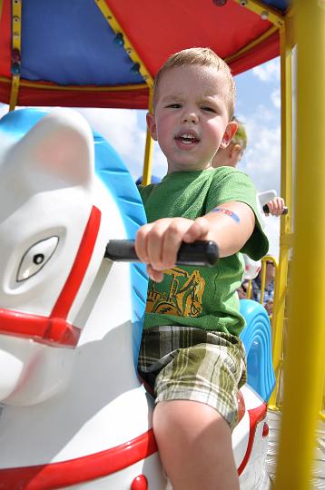 Jackson riding the carousel