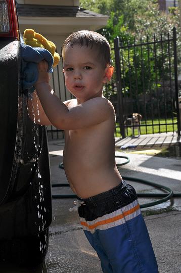 Jackson washing the car