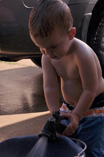Jackson washing the car